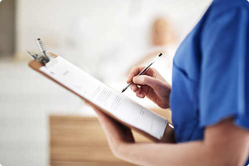 Doctor with a ball sheet